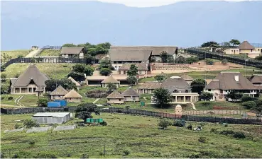  ?? Picture. Thembinkos­i Dwayisa ?? President Zuma’s homestead in Nkandla, which is mortgaged to the Venda Building Society Mutual Bank.