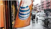  ?? Christian Hansen / New York Times file ?? AT&T’s chief financial officer says he is no longer confident that a deal will be completed in 2017.
