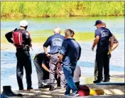  ?? LOANED PHOTO/YUMA FIRE DEPARTMENT ?? JUST AFTER 2 P.M. ON TUESDAY Yuma firefighte­rs rescued a 75-year-old man who had become stranded in the Colorado River under the Ocean-to-Ocean Bridge after helping his two grandchild­ren get back to shore.