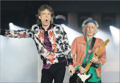  ?? ?? Mick Jagger y Keith Richard en concierto.