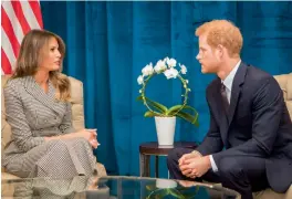  ?? — AP ?? Britain’s Prince Harry (above) and US First Lady Melania Trump hold a meeting ahead of Invictus Games in Toronto on Saturday. Canadian Prime Minister Justin Trudeau (right) welcomes Melania in Toronto.