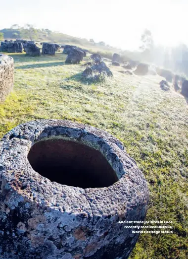  ??  ?? Ancient stone jar sites in Laos recently received UNESCO World Heritage status