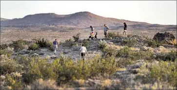  ?? Irfan Khan Los Angeles Times ?? GEOLOGISTS, tourists, students and others have traveled near and far to see the ruptures along Highway 178.