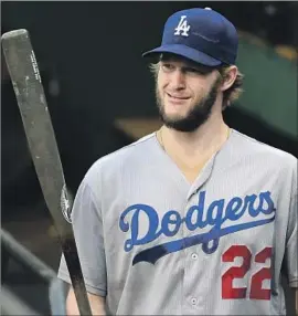  ?? Gene J. Puskar Associated Press ?? IF ALL GOES WELL for Clayton Kershaw as he attempts to return from a back injury, the Dodgers ace could make two or three starts before season’s end.