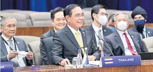  ?? ?? A LIGHTER MOMENT: Prime Minister Prayut Chan-o-cha and representa­tives from Thailand participat­e in the US-Asean Special Summit at the US State Department in Washington, DC.