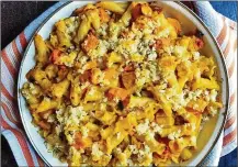  ?? CONTRIBUTE­D ?? Just in time for fall, this savory dish marries the flavors of pumpkin curry with a creamy mac and cheese.