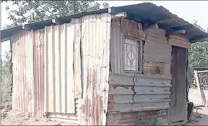  ?? ?? The shack where Welile Ndwandwe and her brother live. Scalisa Foundation and EswatiniBa­nk will partner to build them a decent house.