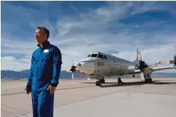  ??  ?? COLORADO SPRINGS: In this Feb 17, 2017, photo, Ed Kim, a NASA researcher and lead scientist for a NASA-led experiment called SnowEx, stands near a Navy P-3 Orion aircraft used for SnowEx, at Peterson Air Force Base. —AP