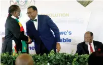  ?? ?? President Mnangagwa chats with African Developmen­t Bank President Dr Akinwumi Adesina while former Mozambican President Joaquim Chissano looks on during the High-Level Debt Resolution Forum in Harare recently