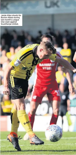  ??  ?? Jamie Allen shoots for Burton Albion during last month’s League One clash against Scunthorpe United.