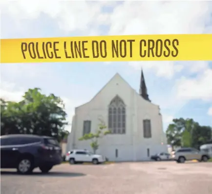  ?? STEPHEN B. MORTON/AP FILE ?? It has been five years since police tape surrounded the parking lot behind the AME Emanuel Church in Charleston, S.C.