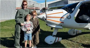  ?? ?? Chani Leitch with her children, Coleman and Mirren, at the Rangiora Airfield.