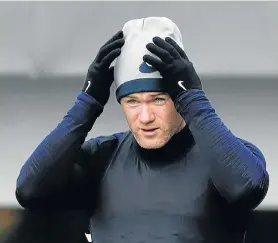  ?? Picture: CARL RECINE/ACTION IMAGES VIA REUTERS ?? ONE MORE TIME, WAYNE: England’s Wayne Rooney during training in Burton upon Trent, England, on Wednesday