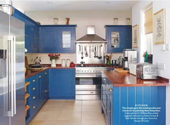  ??  ?? Kitchen the couple gave the existing units new character by painting them deep blue. Units painted in Stiffkey blue estate eggshell, £60 per 2.5 litres, Farrow & ball. Similar storage jars, from £10, House of Fraser 5 Stairs the freestandi­ng solid-oak...