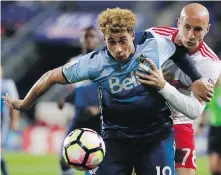  ??  ?? Whitecaps forward Erik Hurtado fends off New York Red Bulls defender Aurelien Collin during their CONCACAF Champions League quarter-final in Harrison, New Jersey.