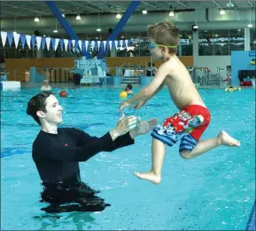  ?? Special to The Okanagan Weekend ?? Kolton Johnson became water safe this summer after taking swim lessons with his instructor, Robert Goldberg. Swim lessons are included in every child membership, because the YMCA believes it is critical for everyone to learn about water safety and take preventati­ve measures when near water.This is just one of the many ways theY is working to drown-proof the Okanagan.