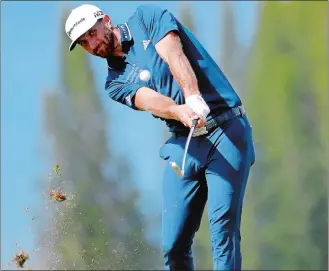  ?? MATT YORK/AP PHOTO ?? Dustin Johnson hits on the fourth fairway during the final round of the Tournament of Champions on Sunday at Kapalua Plantation Course in Kapalua, Hawaii.