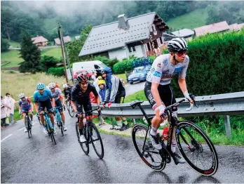  ??  ?? Long to rain over us: Pogačar’s 30km attack on stage 8 crowned him king of the 2021 Tour