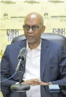  ??  ?? Managing director of the National Road Operating and Constructi­ng Company (NROCC) Ivan Anderson addresses a JIS think tank, yesterday.