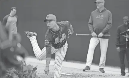  ?? JIM RASSOL/USA TODAY SPORTS ?? The Mets said Thursday that Kodai Senga, shown warming up Monday, has a moderate capsule strain in the back of his right (pitching) shoulder and will be shut down until his symptoms subside.