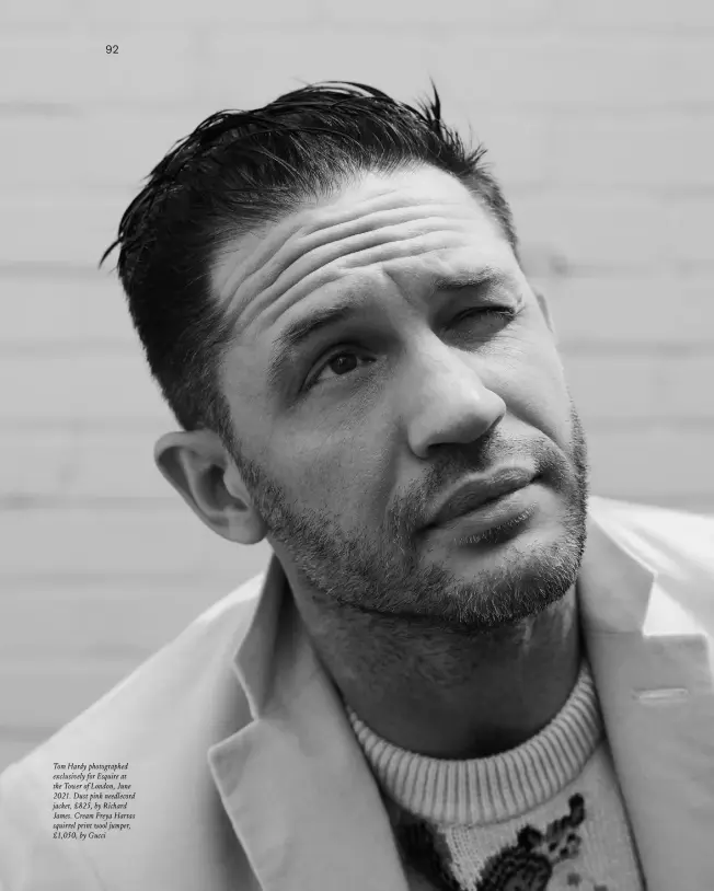  ??  ?? Tom Hardy photograph­ed exclusivel­y for Esquire at the Tower of London, June 2021. Dust pink needlecord jacket, £825, by Richard James. Cream Freya Hartas squirrel print wool jumper, £1,050, by Gucci