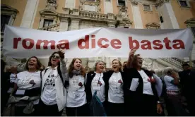  ?? Photograph: Filippo Monteforte/AFP/Getty Images ?? ‘Rome says enough’: People protest at the Piazza del Campidogli­o about the state of Rome.