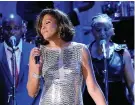  ?? AP Photo/Mark J. Terrill ?? ■ In this Feb. 13, 2011, file photo, singer Whitney Houston performs at the pre-Grammy gala and salute to industry icons honoring David Geffen in Beverly Hills, Calif. Friends of Houston allege that the singer was molested as a child by her cousin Dee...