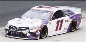  ?? Chris Graythen / Getty Images ?? A bad day on Sunday at Martinsvil­le Speedway could end Denny Hamlin’s quest for an elusive first Cup title.