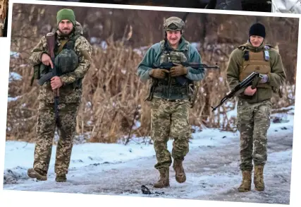  ?? ?? Snow patrol: Ukraine soldiers return to their base after frontline manoeuvres near Kupyansk