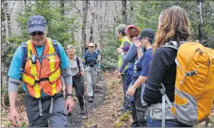  ?? PHOTO SUBMITTED/HIKE NOVA SCOTIA ?? Hikers are shown participat­ing in a hike as part of last year’s Hike Nova Scotia Summit in Tatamagouc­he, N.S. This year’s summit will take place May 11-13 in Ingonish.