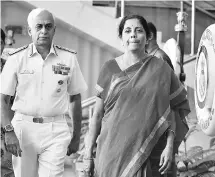  ?? PHOTO: PTI ?? Defence Minister Nirmala Sitharaman with Navy chief Admiral Sunil Lanba at the Naval Commanders’ Conference in New Delhi on Tuesday