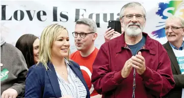  ?? — Reuters photo ?? Adams, and the leader of Sinn Fein in Northern Ireland, Michelle O’Neill, join demonstrat­ors participat­ing in the ‘March For Marriage,’ demanding equal marriage legislatio­n in Northern Ireland, in Belfast, Northern Ireland.