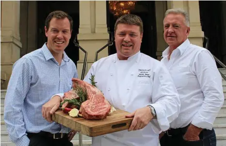 ?? PHOTO: CONTRIBUTE­D ?? BEEFY BUSINESS: FLA general manager Bruce McConnel, Treasury Brisbane executive chef Steven Jones and JBS business developmen­t manager Denis Conroy out the front of the Treasury in Brisbane.