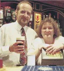  ??  ?? Owners Frank and Doreen Black behind the bar.