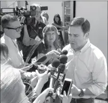  ?? FILE PHOTO BY HOWARD FISCHER CAPITOL MEDIA SERVICES ?? GOV. DOUG DUCEY TAKES QUESTIONS from reporters at a past event.