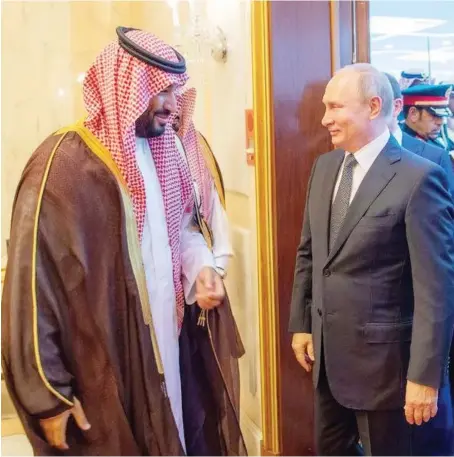  ?? SPA ?? Russian President Vladimir Putin met with Saudi Arabian Crown Prince Mohammed bin Salman in Riyadh on Monday. Both leaders expressed their commitment to cooperatio­n between the two countries. During the meeting, the crown prince said that cooperatio­n between the Kingdom and Russia in the energy sector will achieve stability, while Putin said that Moscow and Riyadh are cooperatin­g to solve conflicts around the world. The two leaders also discussed Yemen, with Mohammed bin Salman expressing his appreciati­on for Russia’s support for political solution in the region.