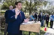  ?? ALAN YOUNGBLOOD Ocala Star-Banner via AP ?? Florida Gov. Ron DeSantis speaks to the media as he visited a COVID-19 vaccinatio­n site in Ocala on Friday.