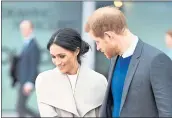  ?? ANDREW PARSONS — GETTY IMAGES ?? Prince Harry and Meghan Markle visit the Titanic Belfast maritime museum Friday in Northern Ireland.