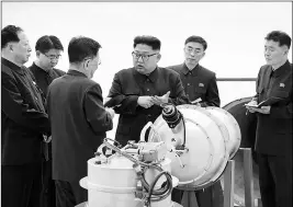  ?? REUTERS ?? North Korean leader Kim Jong Un provides guidance on a nuclear weapons programme in this undated photo released by the Korean Central News Agency in Pyongyang on September 3