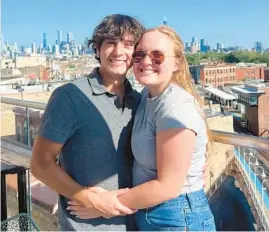  ?? KATIE RICHARDS ?? Miguel Corzo and Katie Richards, seen last fall in Chicago, got engaged during the April 8 eclipse after participat­ing in the Marriage Pact at Boston College in early 2021.