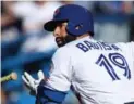  ?? TOM SZCZERBOWS­KI/GETTY IMAGES ?? The two mutual-option years in Jose Bautista’s new deal are unlikely to come into play — no matter how he plays.