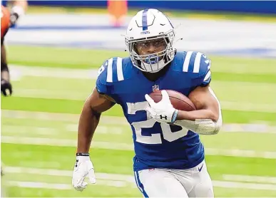  ?? MICHAEL CONROY/ASSOCIATED PRESS ?? Rookie running back Jonathan Taylor will lead the Indianapol­is ground game when the Colts play the Lions in Detroit on Sunday. Indy is looking for its fifth victory.