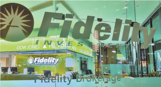  ?? STAFF FILE PHOTO BY NICOLAUS CZARNECKI ?? HIGH-TECH: The interior of Fidelity Investment­s is shown on Congress Street in Boston. Fidelity has used artificial intelligen­ce in its call centers to help customers with their investment goals.