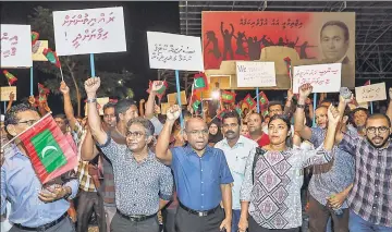  ?? AP ?? ■ In February 2012, Mohamed Nasheed, Maldives’ first democratic­ally elected President, was forced to resign by police and army officers in what he said amounted to a coup. His ouster followed protests against his order to arrest a top judge.