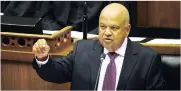  ?? Picture: DAVID RITCHIE ?? MAKING A POINT: Finance Minister Pravin Gordhan delivering his seventh Budget speech in Parliament yesterday.