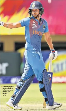  ?? GETTY ?? Harmanpree­t Kaur became the first Indian woman to score a T20 century.