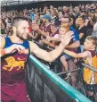  ?? Picture: AAP IMAGE ?? Stefan Martin celebrates with Lions fans.