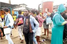  ?? PHOTO: ENIOLA DANIEL ?? The casual workers protesting outside the company premises yesterday.