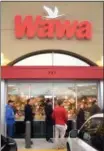  ??  ?? Hundreds stood in line to get their limited edition Wawa Winter Reserve Coffee Stout.