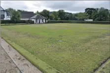  ?? ?? The bare and parched green at Brodick Bowling Club.